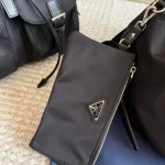Black and silver nylon backpack with a small pouch-no box - Image 10