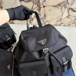Black and silver nylon backpack with a small pouch-no box - Image 6