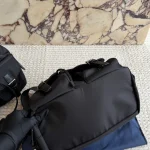 Black and silver nylon backpack with a small pouch-no box - Image 5