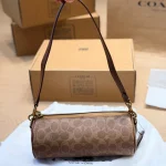 Features a slim leather strap. Wear it as a top handle, shoulder bag, or crossbody-box - Image 2