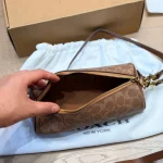Features a slim leather strap. Wear it as a top handle, shoulder bag, or crossbody-box - Image 5