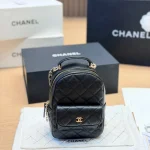 Mini backpack in black pebbled calfskin with gold-tone accents-box - Image 7