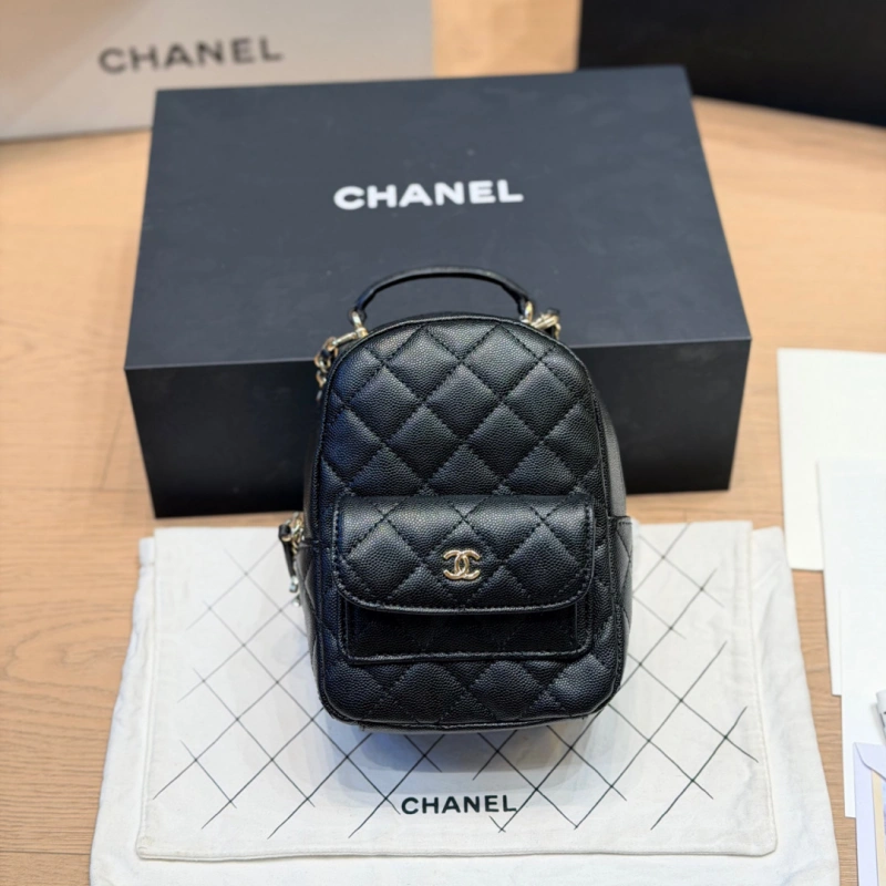 13429073920535600 Mini backpack in black pebbled calfskin with gold-tone accents-box - Image 1