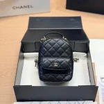 Mini backpack in black pebbled calfskin with gold-tone accents-box - Image 5