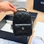 Mini backpack in black pebbled calfskin with gold-tone accents-box - Image 4