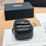 Mini backpack in black pebbled calfskin with gold-tone accents-box - Image 10