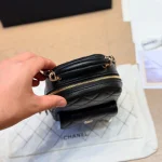 Mini backpack in black pebbled calfskin with gold-tone accents-box - Image 9