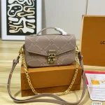 Features an adjustable strap for crossbody or underarm wear. Multiple ways to carry-box - Image 4