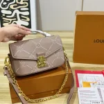 Features an adjustable strap for crossbody or underarm wear. Multiple ways to carry-box - Image 7