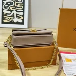 Features an adjustable strap for crossbody or underarm wear. Multiple ways to carry-box - Image 6