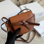 Can be worn as a chest bag or a crossbody! The cowhide leather feels absolutely amazing. The leather quality is just top-notch! Saddle bag-box - Image 3