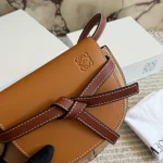 Can be worn as a chest bag or a crossbody! The cowhide leather feels absolutely amazing. The leather quality is just top-notch! Saddle bag-box - Image 12