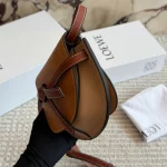 Can be worn as a chest bag or a crossbody! The cowhide leather feels absolutely amazing. The leather quality is just top-notch! Saddle bag-box - Image 11
