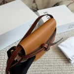 Can be worn as a chest bag or a crossbody! The cowhide leather feels absolutely amazing. The leather quality is just top-notch! Saddle bag-box - Image 10