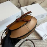 Can be worn as a chest bag or a crossbody! The cowhide leather feels absolutely amazing. The leather quality is just top-notch! Saddle bag-box - Image 9