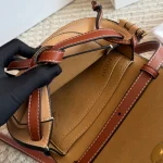 Can be worn as a chest bag or a crossbody! The cowhide leather feels absolutely amazing. The leather quality is just top-notch! Saddle bag-box - Image 6