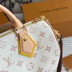 Featuring our iconic pillow bag silhouette, paired with a fun limited-edition charm-box - Image 2