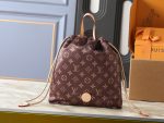 LV New Keeper Handbag with Curved Drawstring Tab & LV Circle Leather Patch