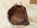 LV New Keeper Handbag with Curved Drawstring Tab & LV Circle Leather Patch - Image 9
