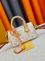 LV Crafty Speedy Nano Monogram Handbag with Detachable Crossbody Strap - Image 11
