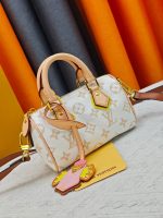 LV Crafty Speedy Nano Monogram Handbag with Detachable Crossbody Strap - Image 12