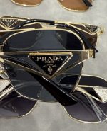 Prada Triangle‑Logo Metal Frame Sunglasses with Gradient Lenses, Polygonal / Butterfly / Double‑Bridge Frame - Image 2