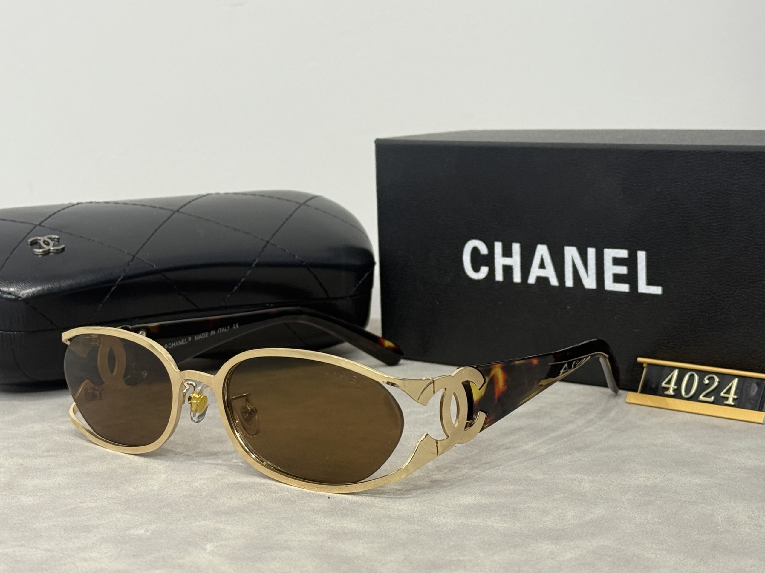 de76c69b Chanel Hollow‑Out Double‑C Metal Logo Gradient Sunglasses - Image 1
