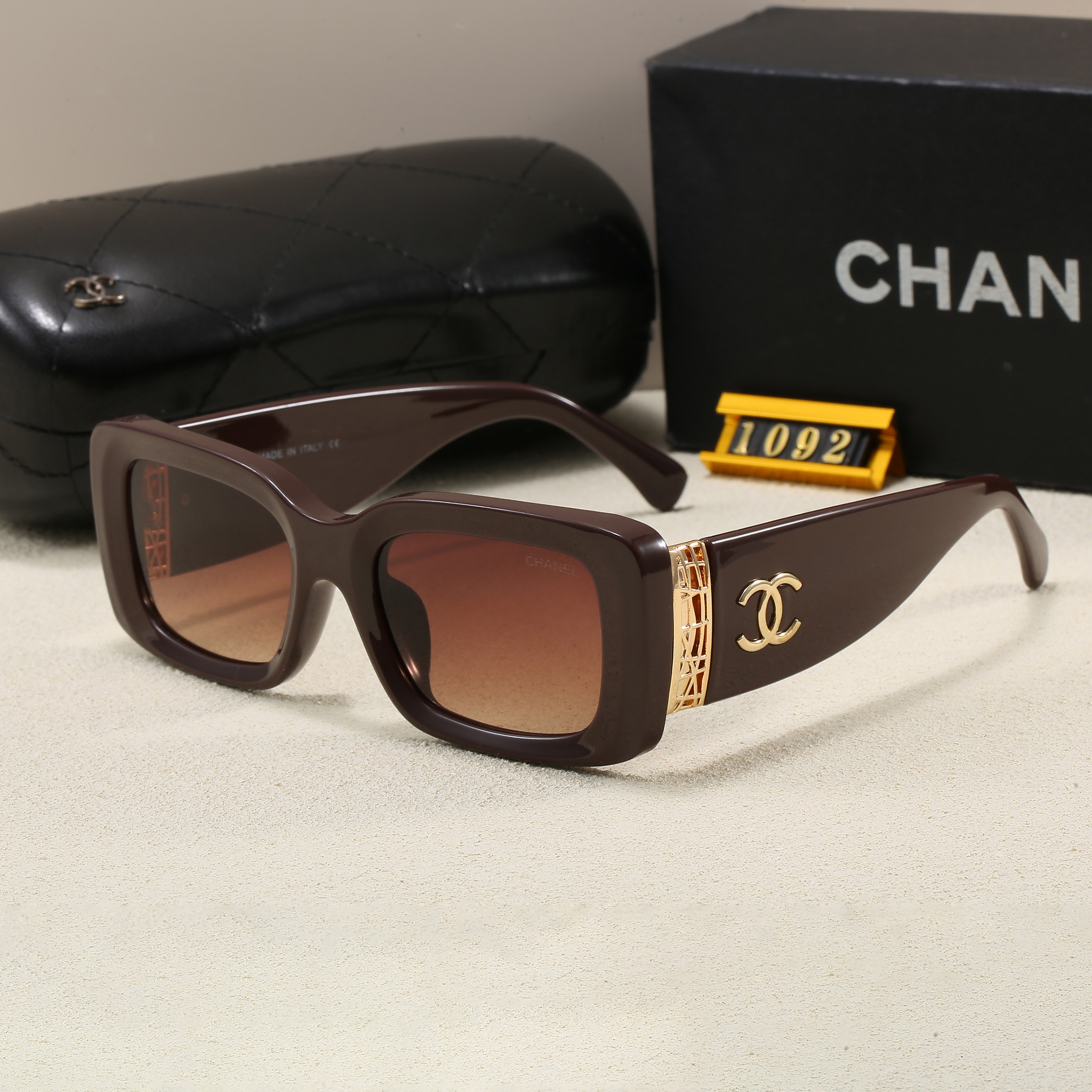 e22eb833 Chanel Wide‑Temple Sunglasses with Double‑C Metal Logo, Hollow‑Out Decoration / Quilted‑Pattern Temples - Image 1