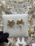 Dior Gold Tone Rhinestone Bow & Pearl Asymmetric Drop Earrings - CD Letter Charm