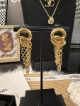 Chanel Gold Tone Twisted Double Ring Tassel Chain Drop Earrings