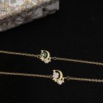 Dior New Bow Enamel Letter Bracelet, available in pink and green - Image 2