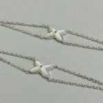 Chaumet White Mother-of-Pearl Criss-Cross Double Chain Bracelet,  gold-toned / white gold-toned - Image 5