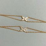 Chaumet White Mother-of-Pearl Criss-Cross Double Chain Bracelet,  gold-toned / white gold-toned - Image 4