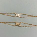 Chaumet White Mother-of-Pearl Criss-Cross Double Chain Bracelet,  gold-toned / white gold-toned - Image 2