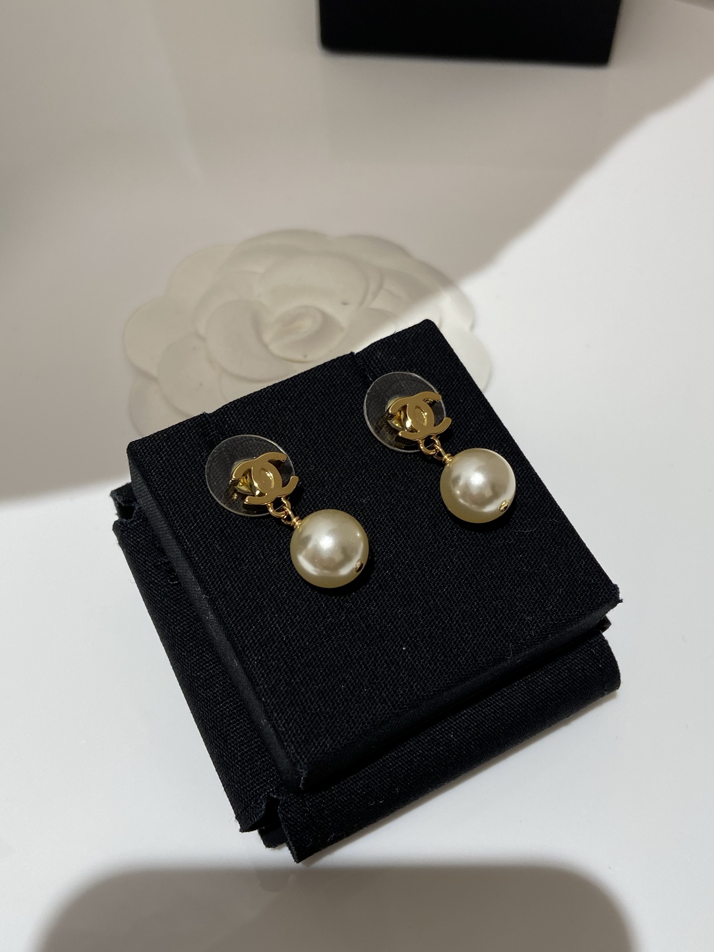 wsxc1789398083015_3 Chanel New Minimalist Gold-toned Smooth Double C Pearl Earrings - Image 1
