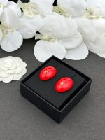 Chanel 26B Oval Enamel Double C Earrings, available in white, red, and black - Image 5