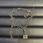 LV Openwork Monogram Flower Key & Petite Malle Charm Bracelet - Gold Tone / Silver Tone - Image 2