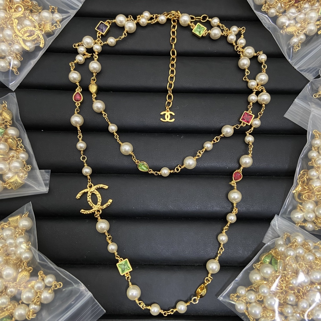 wsxc1789558385992_0 Chanel Colored Crystals & Faux Pearls Long Pendant Necklace - Image 1