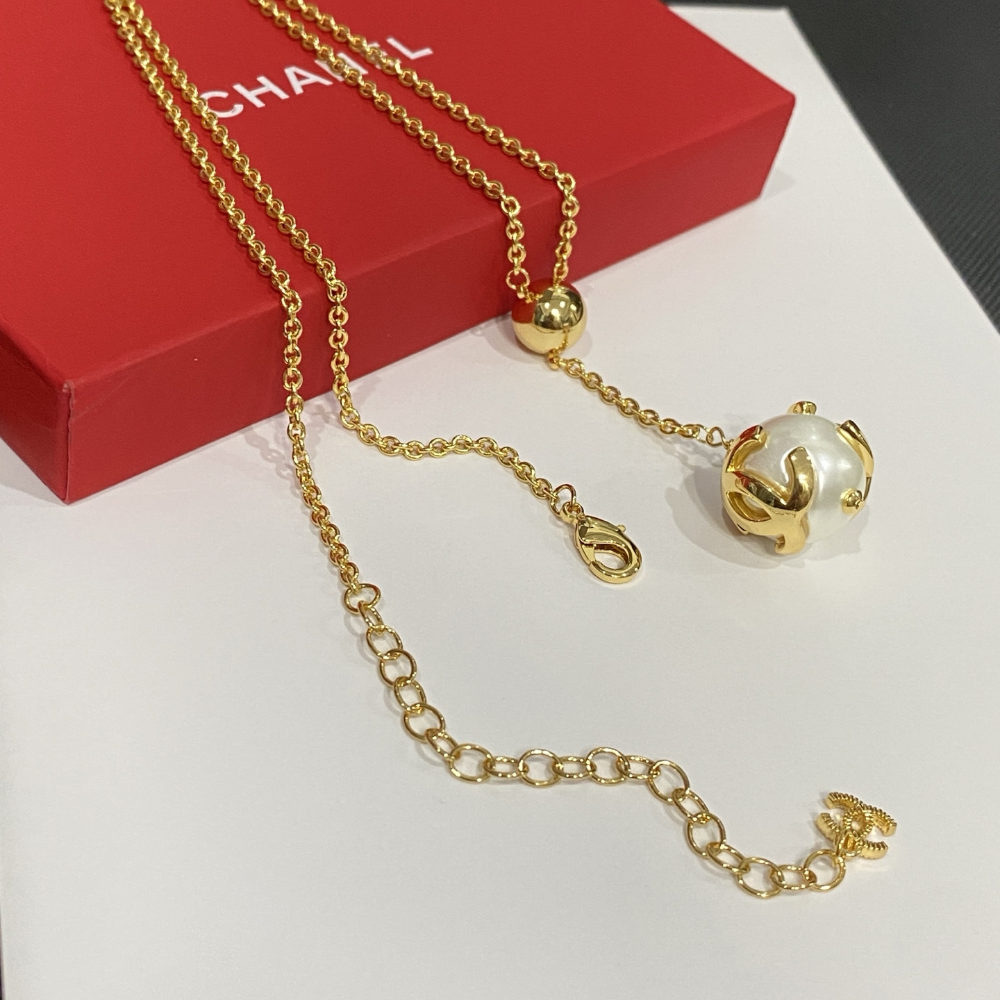 wsxc1789654712353_0 Chanel CC Logo Openwork Gold-Tone Ball Faux Pearl Pendant Necklace - Image 1