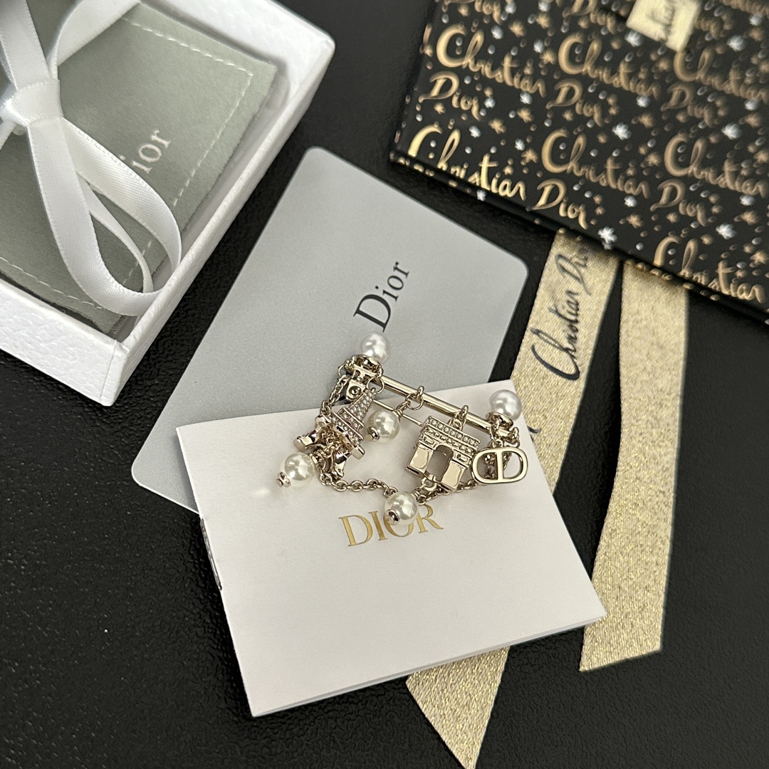 wsxc1789660748560_0 Dior Vintage Silver Safety Pin Brooch with Eiffel Tower & Arc de Triomphe Charms (Faux Pearl Dangles) - Image 1