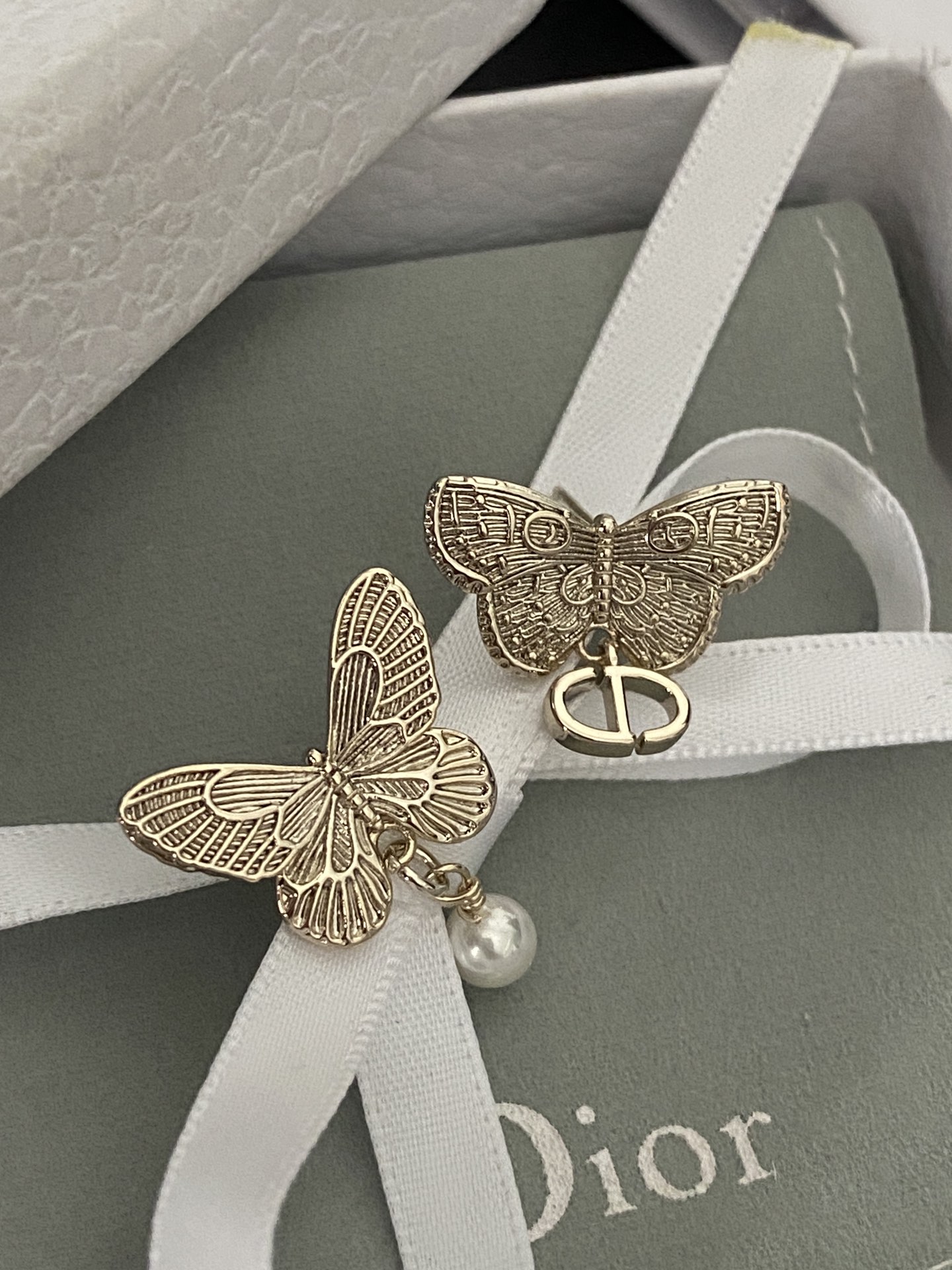 wsxc1789664152080_0 Dior Vintage Hollow-out Butterfly Earrings (Asymmetrical CD Logo & Faux Pearl Drop Studs) - Image 1