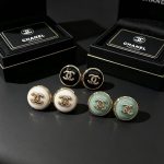 Chanel enamel resin with gold tone CC logo stud earrings