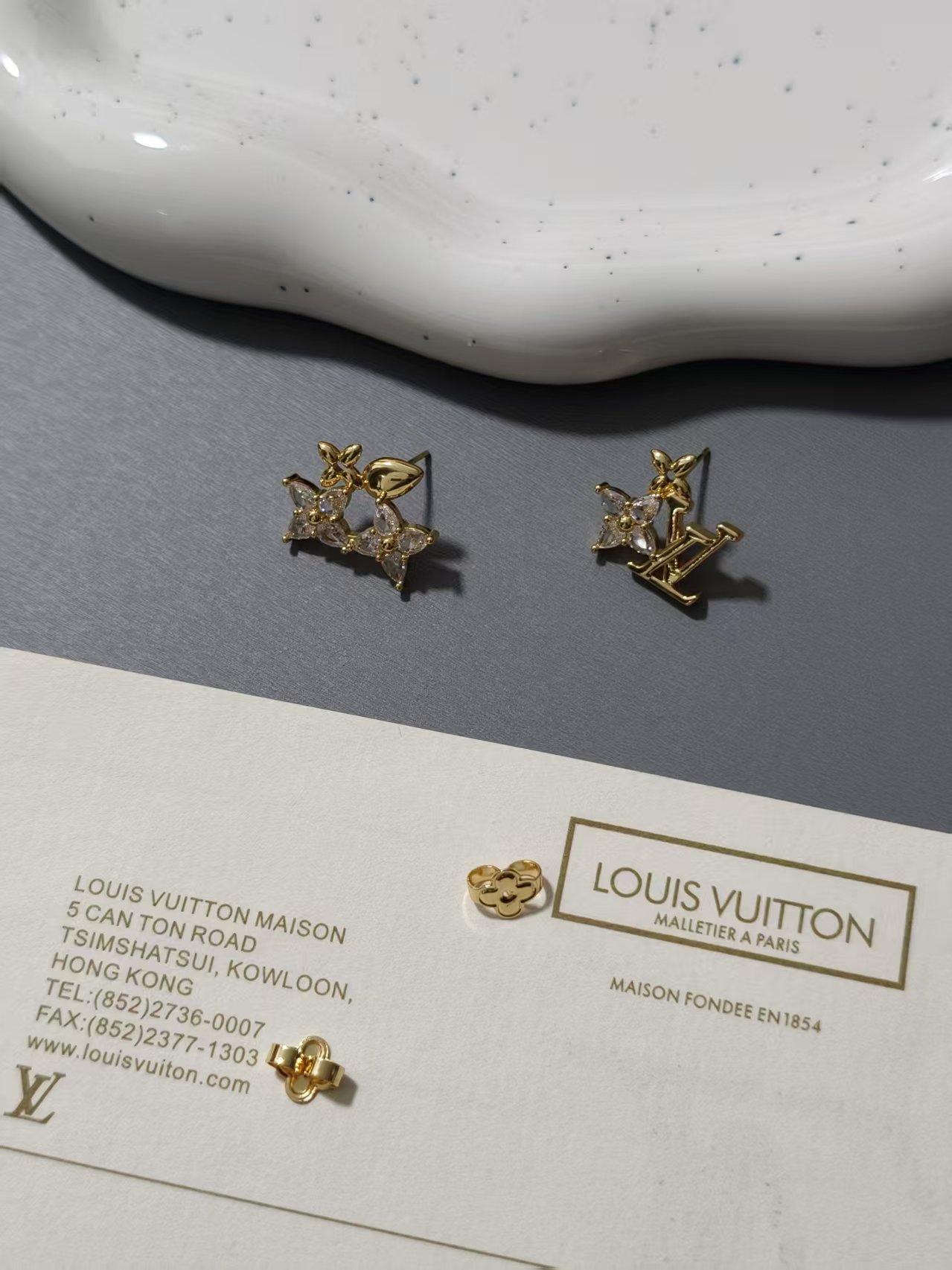 wsxc1789904561370_0 LV Asymmetric Stud Earrings, Monogram Flower & LV Logo with Crystals - Image 1