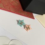 Chanel Two-Tone Star Stud Earrings, Mismatched Colors