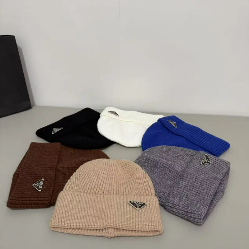 wsxc1790264746406_1 Prada Metal Triangle Logo Ribbed Knit Beanie - Image 1