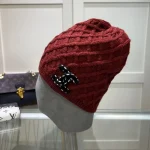 Chanel Knit Beanie:Diagonal diamond cable knit beanie. Color block thick yarn appliqué logo with flecked edge option. - Image 7