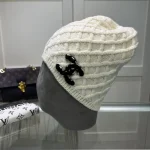 Chanel Knit Beanie:Diagonal diamond cable knit beanie. Color block thick yarn appliqué logo with flecked edge option. - Image 4