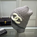 Chanel Knit Beanie:Pineapple stitch chunky knit beanie. 3D raised thick yarn appliqué logo. - Image 8
