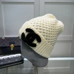 Chanel Knit Beanie:Pineapple stitch chunky knit beanie. 3D raised thick yarn appliqué logo. - Image 10