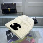 Chanel Knit Beanie:Pineapple stitch chunky knit beanie. 3D raised thick yarn appliqué logo. - Image 6